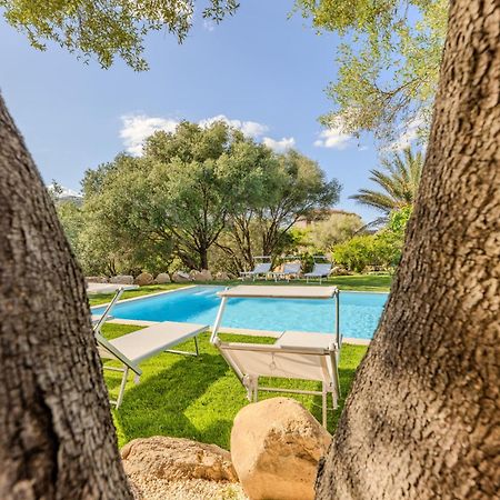 Апартаменты Stazzo San Teodoro L'Olivastro Piscina Condivisa Экстерьер фото
